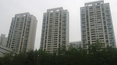 项目全玫瑰金石材干挂立面